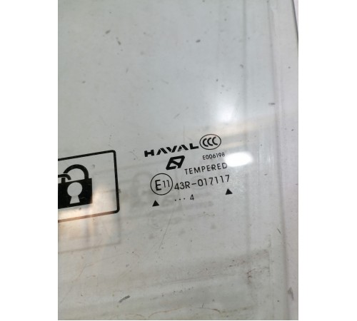 Стекло двери переднее левое