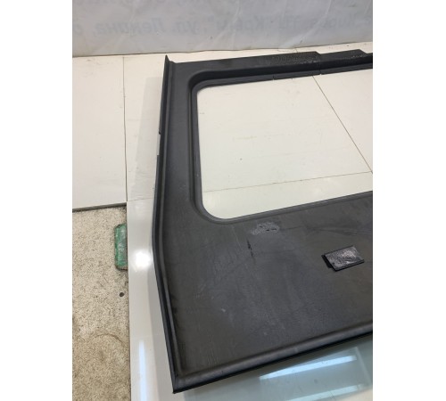 Обшивка багажника (левая)