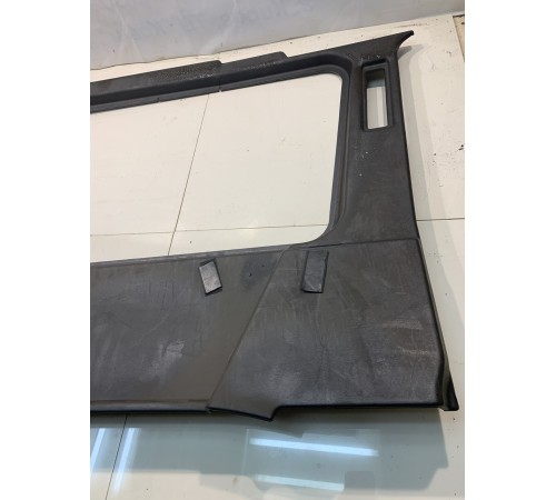 Обшивка багажника (левая)