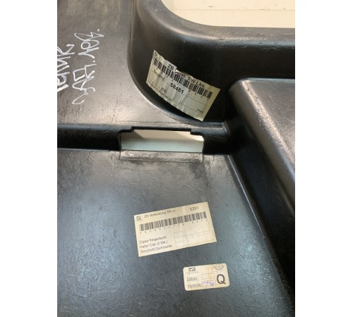 Обшивка багажника (левая)