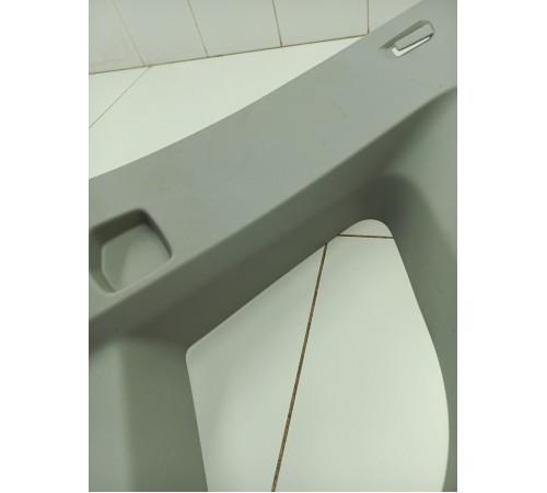 Обшивка багажника левая