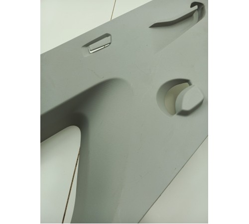 Обшивка багажника левая