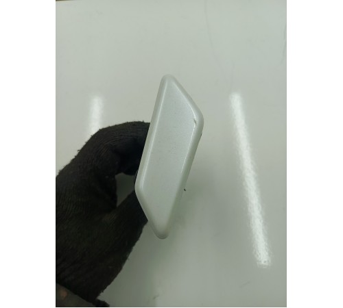 Форсунка омывателя фар левая