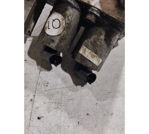 Блок клапанов гидроподвески передний