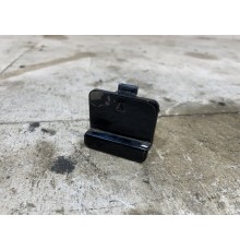 Заглушка переднего бампера буксировочного крюка