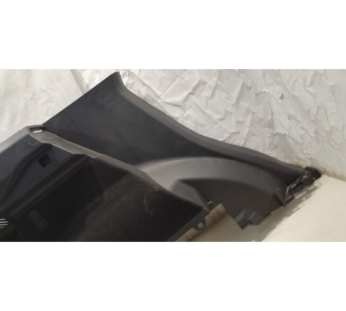 Обшивка багажника (задняя, левая)