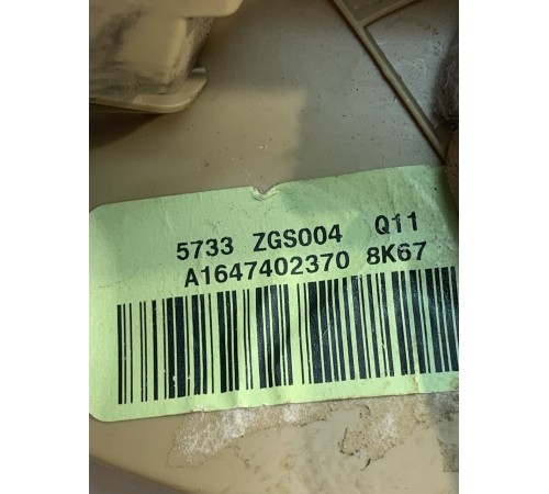 Обшивка двери багажника (левая)