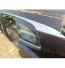 Глухое стекло заднее левое