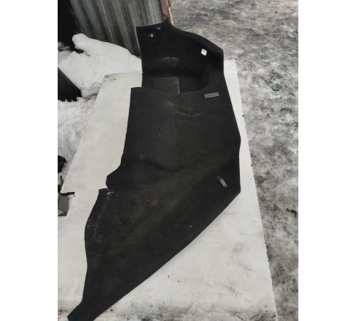 Обшивка багажника левая