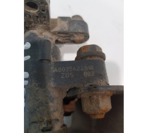 Кран уровня кузова