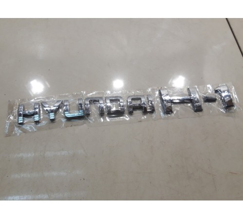 Эмблема крышки багажника