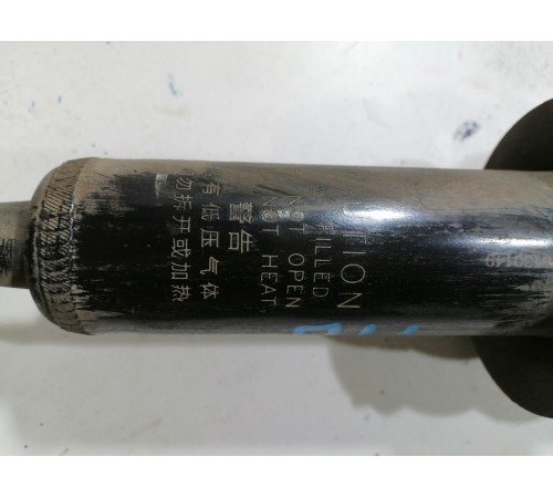 Амортизатор подвески передний левый