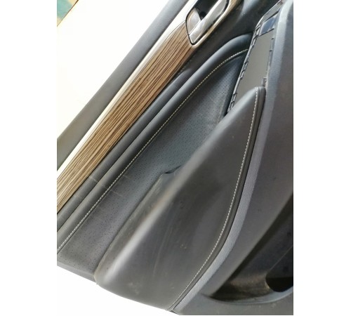 Обшивка двери передняя левая