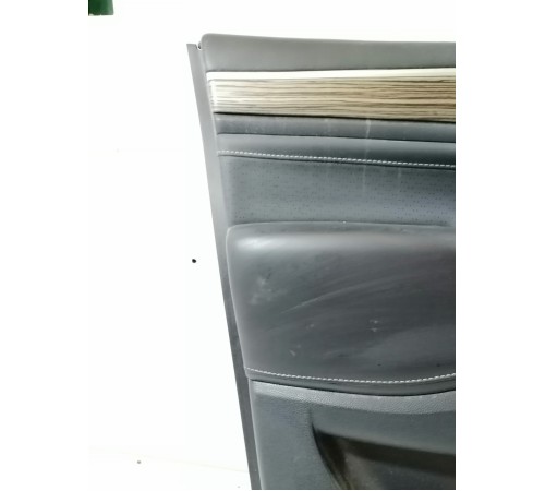 Обшивка двери передняя левая