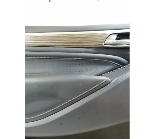 Обшивка двери передняя левая