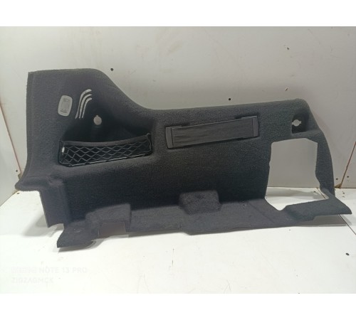 Обшивка багажника левая