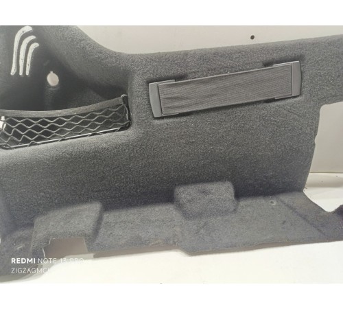 Обшивка багажника левая