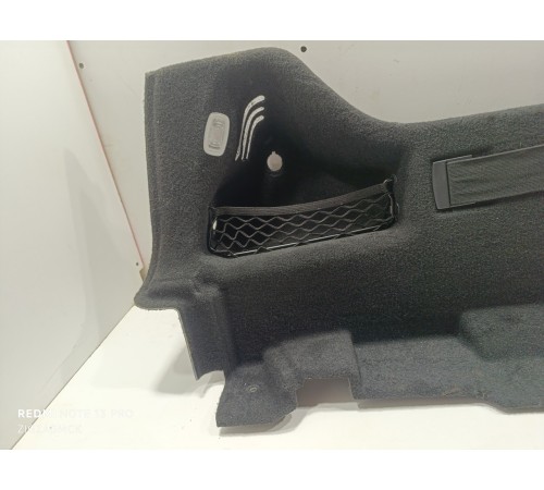 Обшивка багажника левая