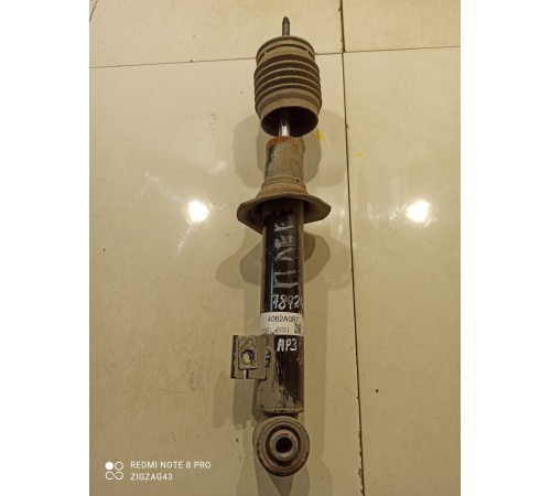 Амортизатор (передний, левый)