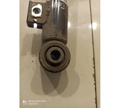 Амортизатор (передний, левый)