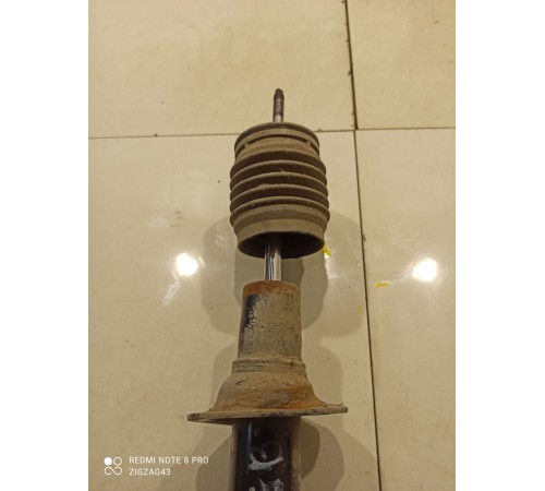 Амортизатор (передний, левый)