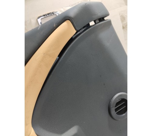 Обшивка двери передняя левая