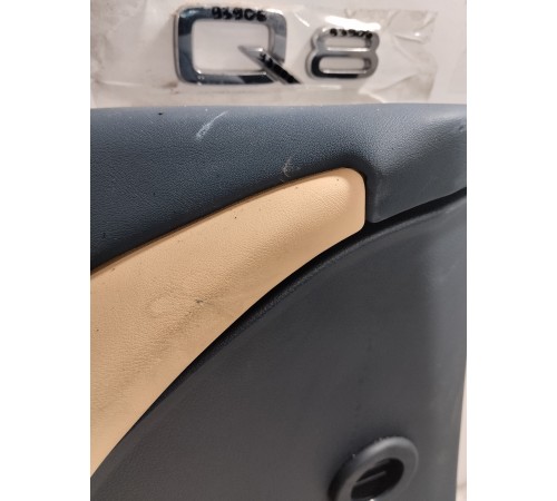 Обшивка двери передняя левая