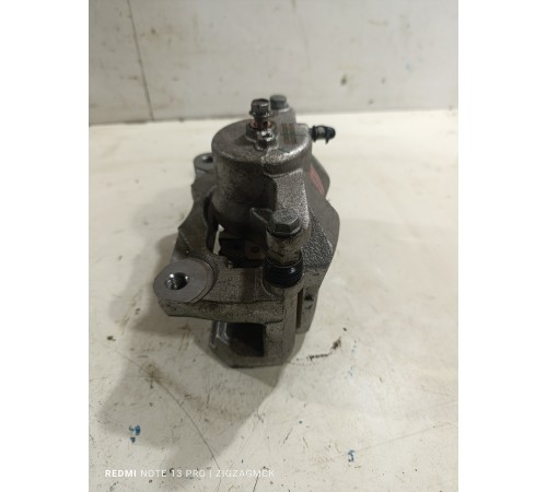 Суппорт тормозной передний левый