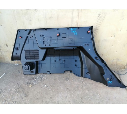 Обшивка багажника правая 