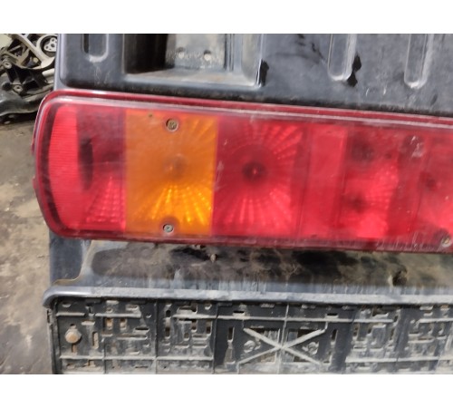 Задний брызговик в сборе с фонарем левый