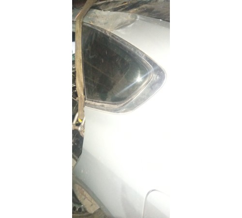 Стекло кузовное заднее левое