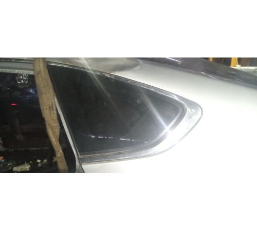 Стекло кузовное заднее левое