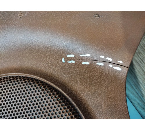 Обшивка багажника (левая)