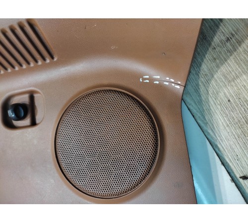 Обшивка багажника (левая)