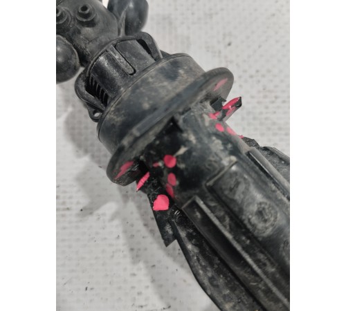 Форсунка омывателя фары левая