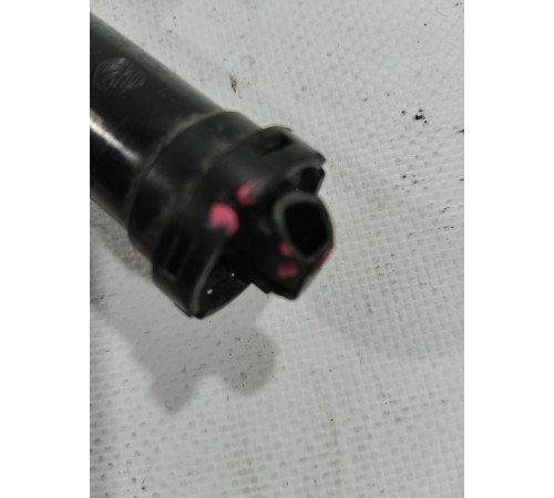 Форсунка омывателя фары левая