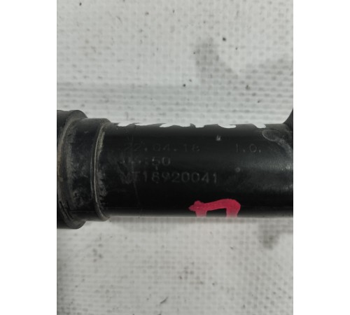 Форсунка омывателя фары левая