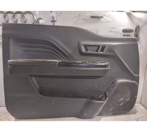 Обшивка двери передняя левая