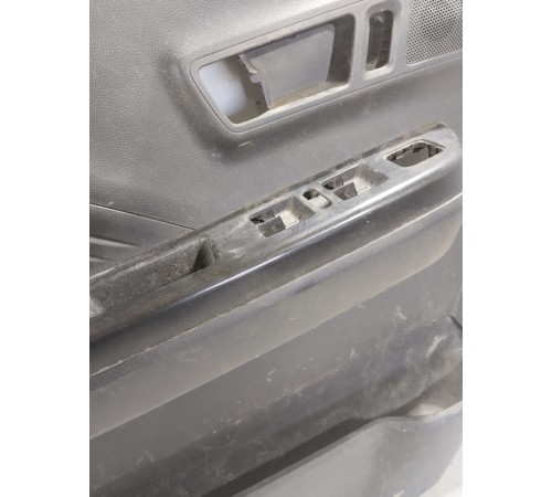 Обшивка двери передняя левая