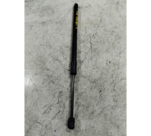 Амортизатор капота левый