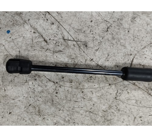 Амортизатор капота левый