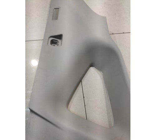 Обшивка багажника (задняя, левая)