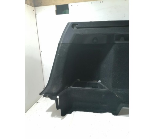 Обшивка багажника левая