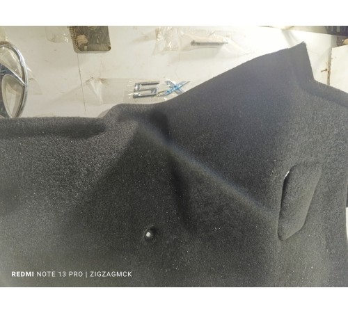 Обшивка багажника левая