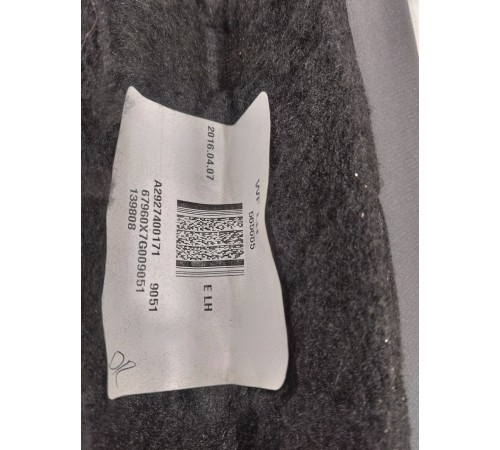 Обшивка крышки багажника (левая)