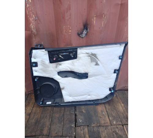 Обшивка двери передняя левая