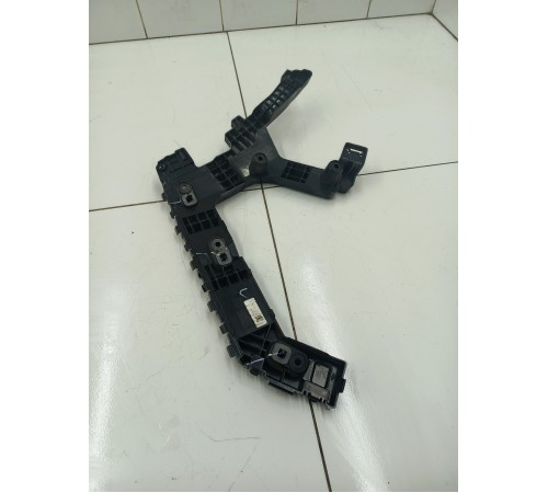 Кронштейн (крепление) заднего бампера левый