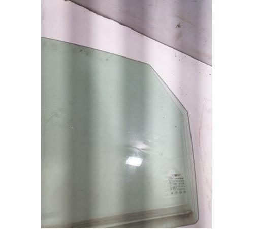 Стекло двери заднее левое