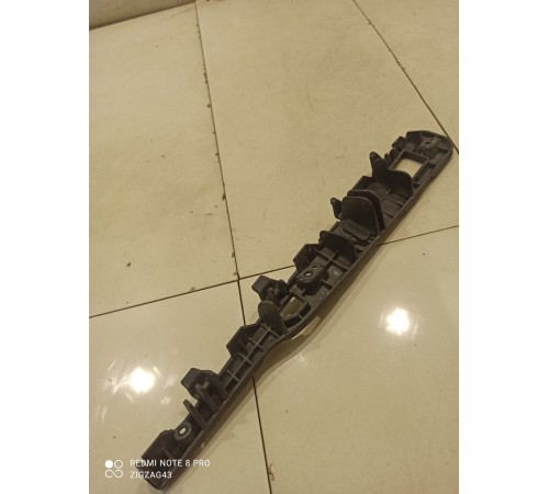 Крепеж фары(ресничка) левый