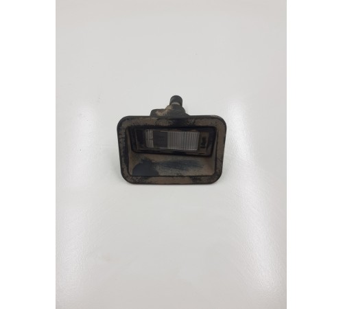 Плафон освещения номерного знака левый